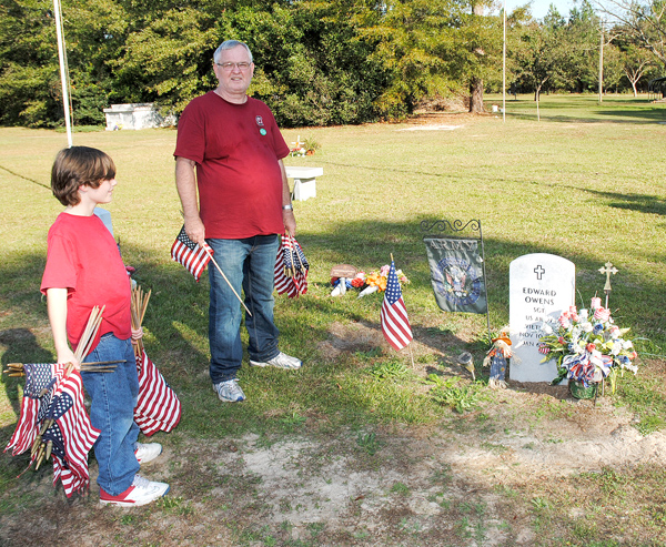 Graves Of Veterans Marked With Flags