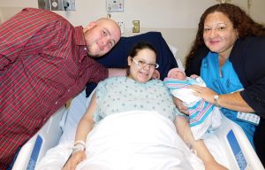 Parents Steven and Miranda Bethea and Dr. Rebecca Craig, who delivered little Charlie!.